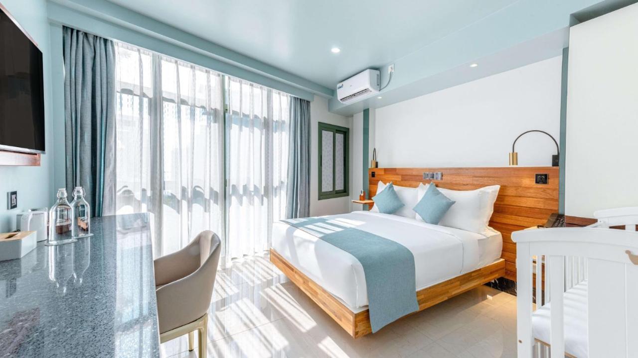 Two-Bedroom Suite with Partial Sea View (Free Return Airport Transport)